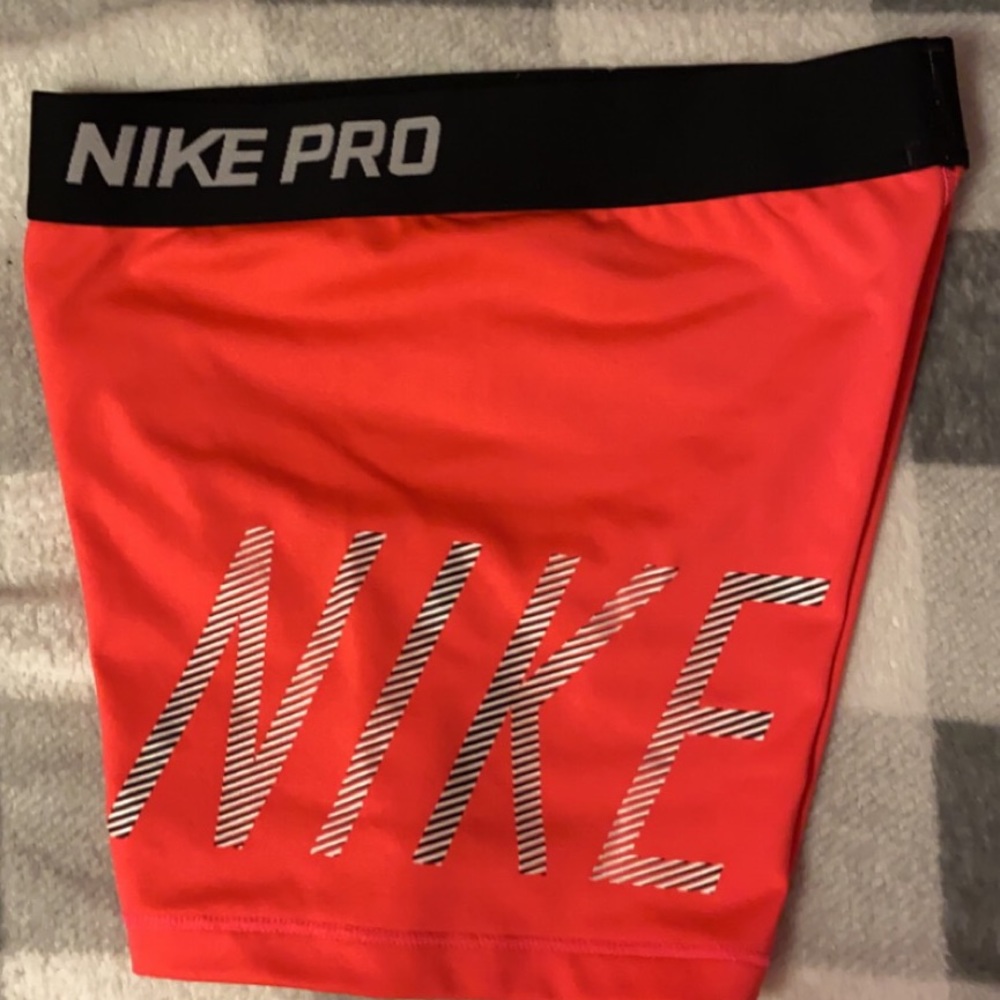 girls size medium bright pink nike pro spandex